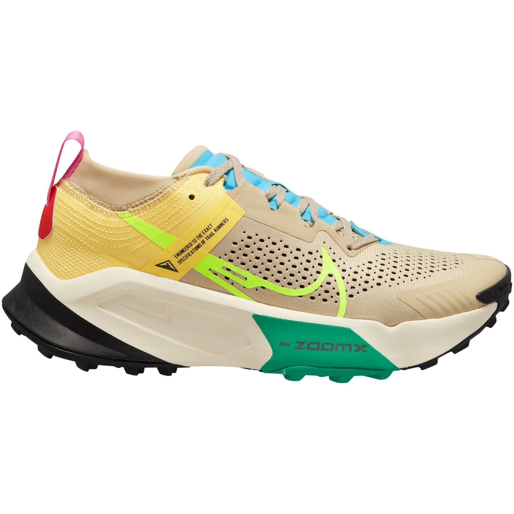 Side view on white background of Womens Nike ZoomX Zegama Trail running shoe in Team Gold and Volt-Citron Pulse, Medium (Regular) width