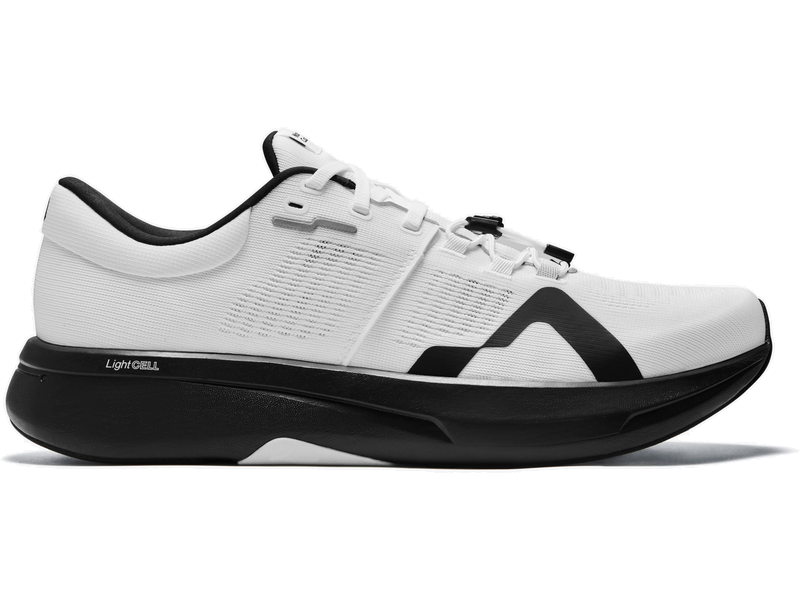 Side view on white background of Womens Mount To Coast R1 running shoe in White/Black, Medium (Regular) width