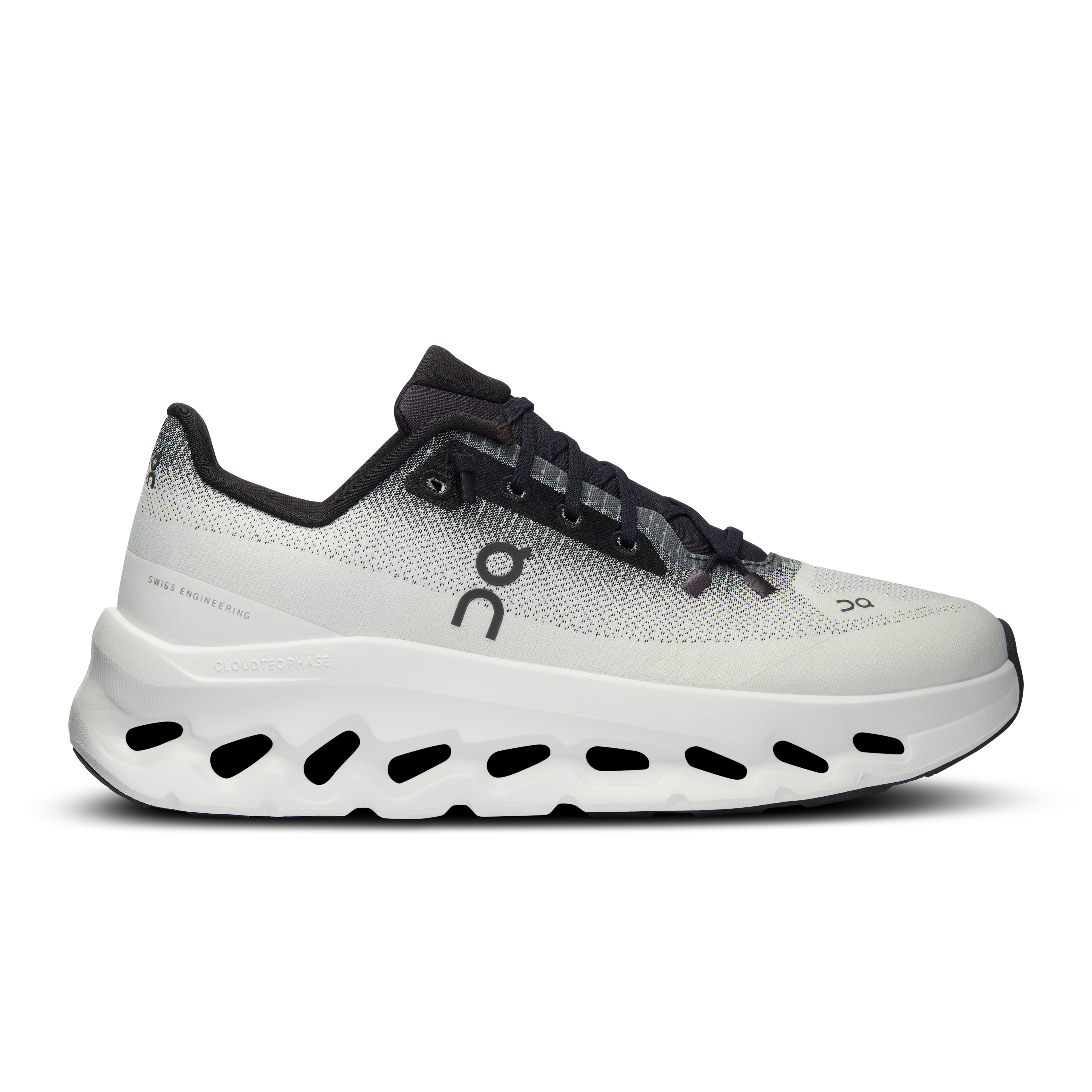 Side view on white background of Womens On Cloudtilt running shoe in Black/Ivory, Medium (Regular) width