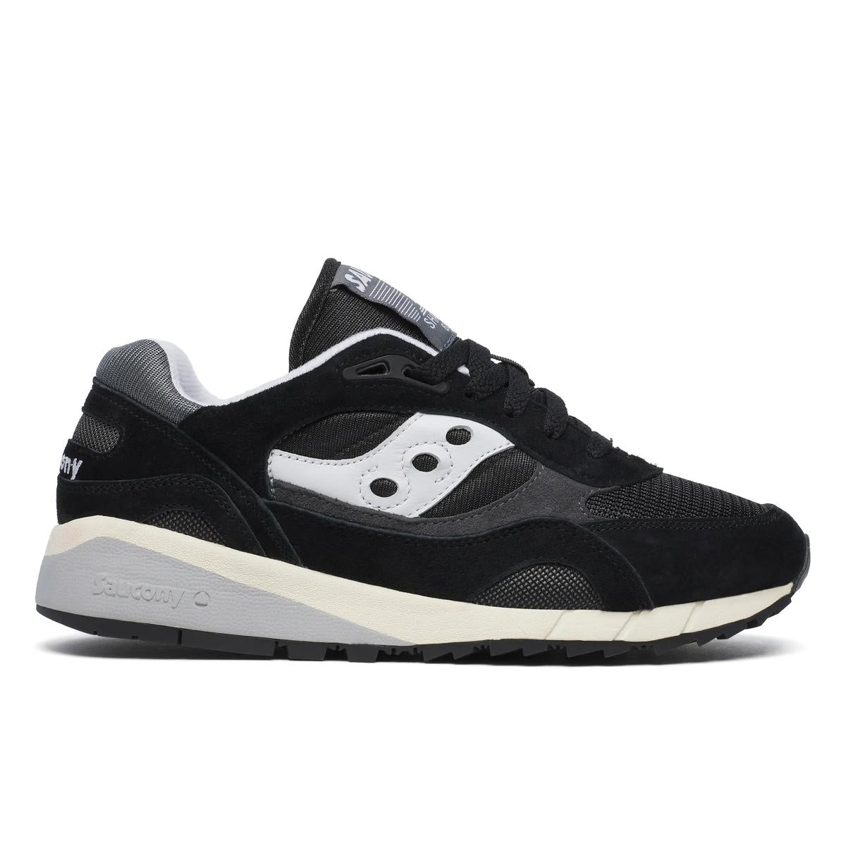 Side view on white background of Mens Saucony Shadow 6000 running shoe in Black/Grey, Medium (Regular) width