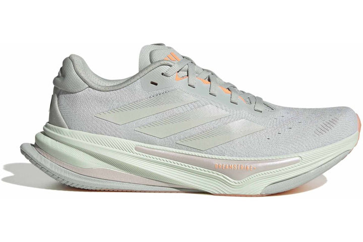 Side view on white background of Womens Adidas Supernova Prima 2 running shoe in Wonder Silver/Crystal Jade/Beam Orange, Medium (Regular) width