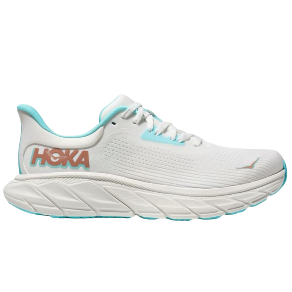Side view on white background of Womens Hoka Arahi running shoe in Frost/Rose Gold, Medium (Regular) width