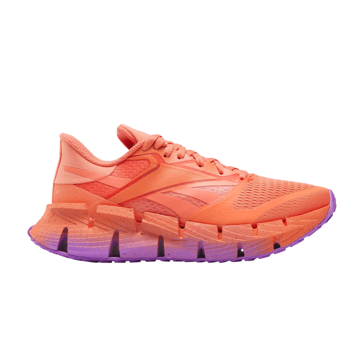 Side view on white background of Womens Reebok Floatzig 1 running shoe in Coral and Coral and Purple, Medium width