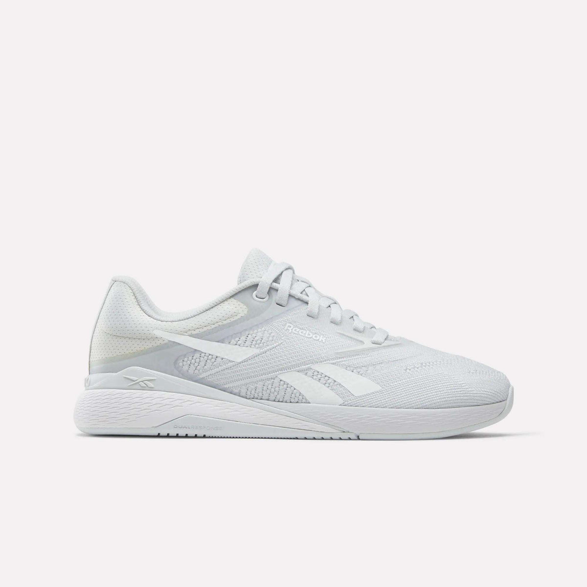 Side view on white background of Womens Reebok Nano X5 running shoe in  Moon/Y2K Blue/Ftwr White, Medium (Regular) width