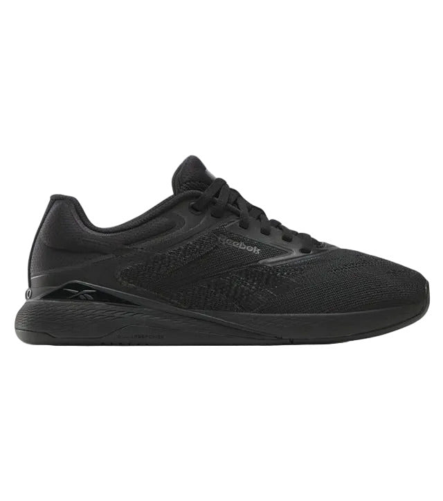 Side view on white background of Womens Reebok Nano X5 running shoe in Black/Grey, Medium (Regular) width