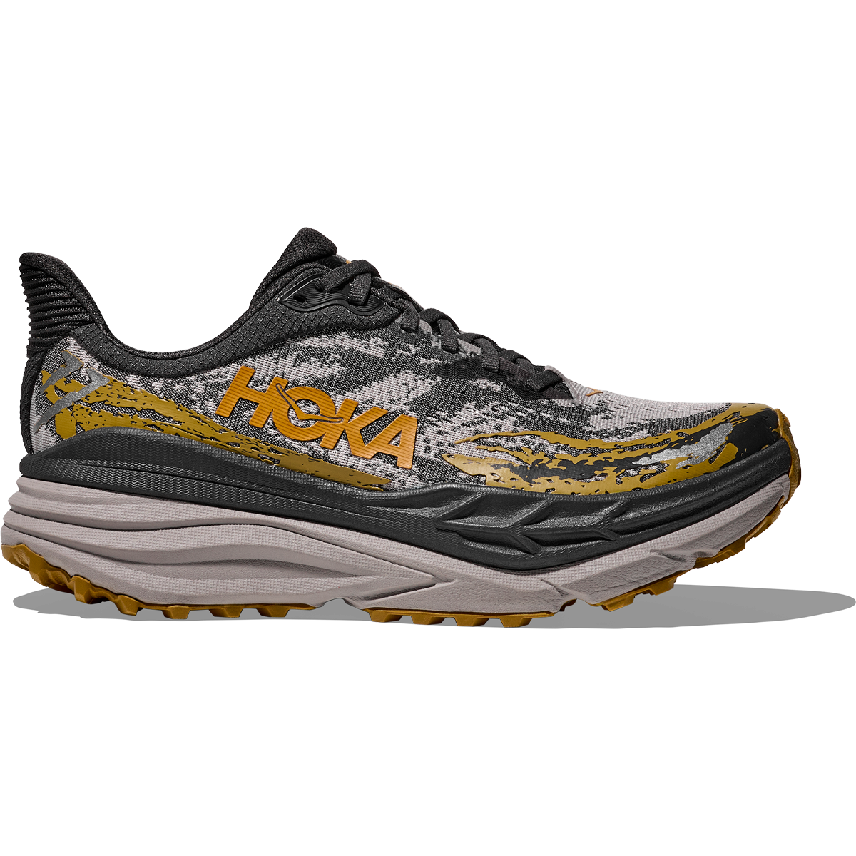 Side view on white background of Mens Hoka Stinson 7 running shoe in Black/Cement, Medium (Regular) width