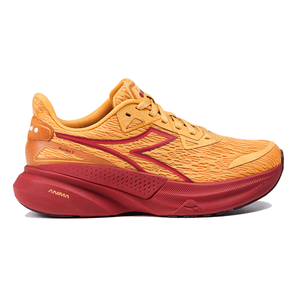 Side view on white background of Womens Diadora Nucleo 2 running shoe in Honey Yellow/Red Dahlia, Medium (Regular) width