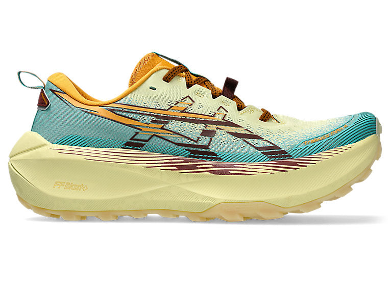Side view on white background of Mens Asics Trabuco Max 4 running shoe in Wheat Yellow/Dark Red Planet, Medium (Regular) width