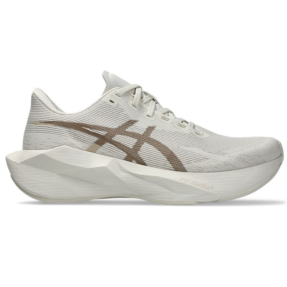 Side view on white background of Mens Asics Novablast running shoe in Soft Oat/Greige, Medium (Regular) width