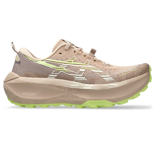 Side view on white background of Womens Asics Trabuco Max 4 running shoe in Pale Apricot/Cream, Medium (Regular) width