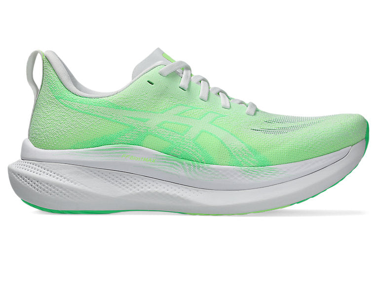 Side view on white background of Womens Asics Glideride Max 2 running shoe in White/Vital Green, Medium (Regular) width