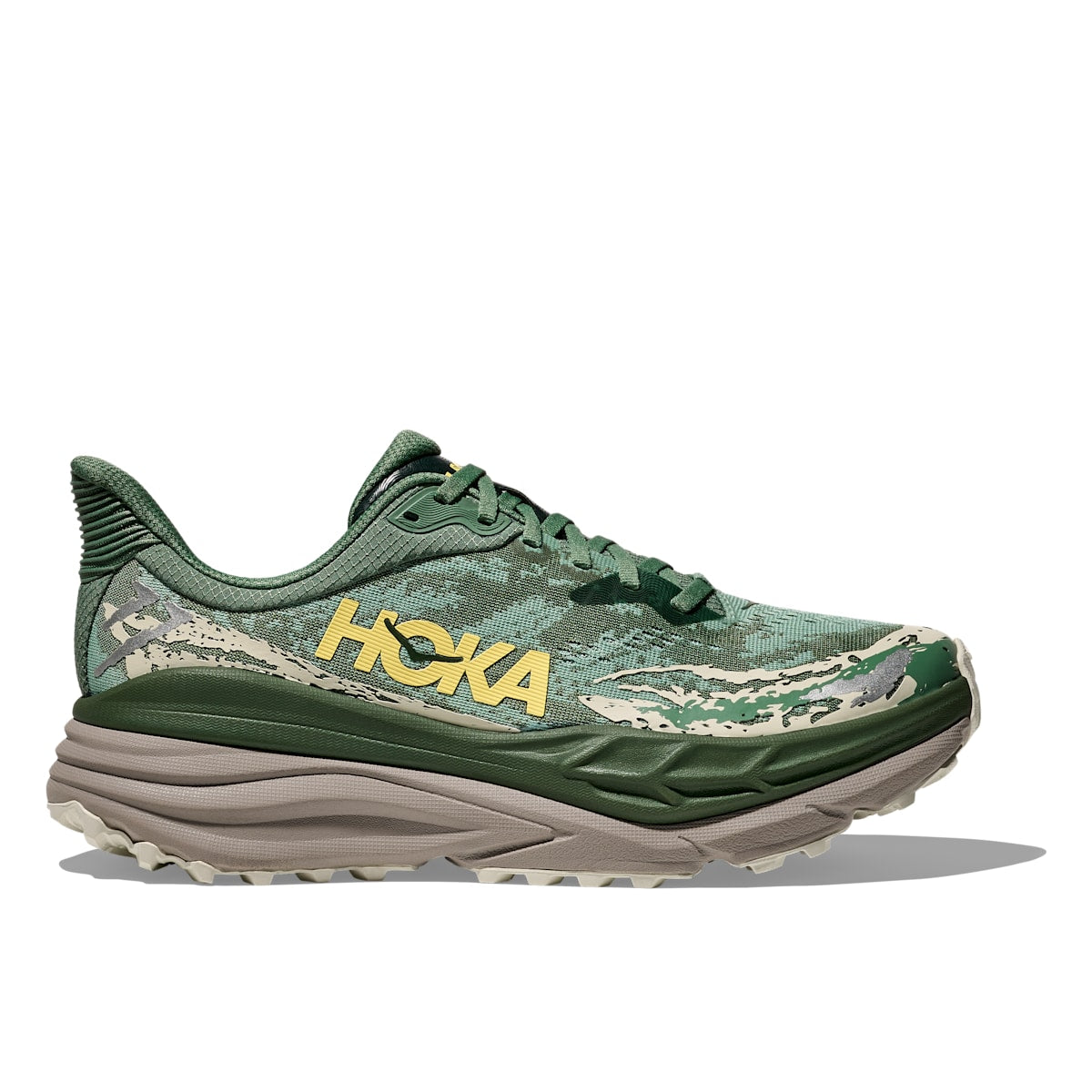 Side view on white background of Mens Hoka Stinson 7 running shoe in Fern/Cement, Medium (Regular) width