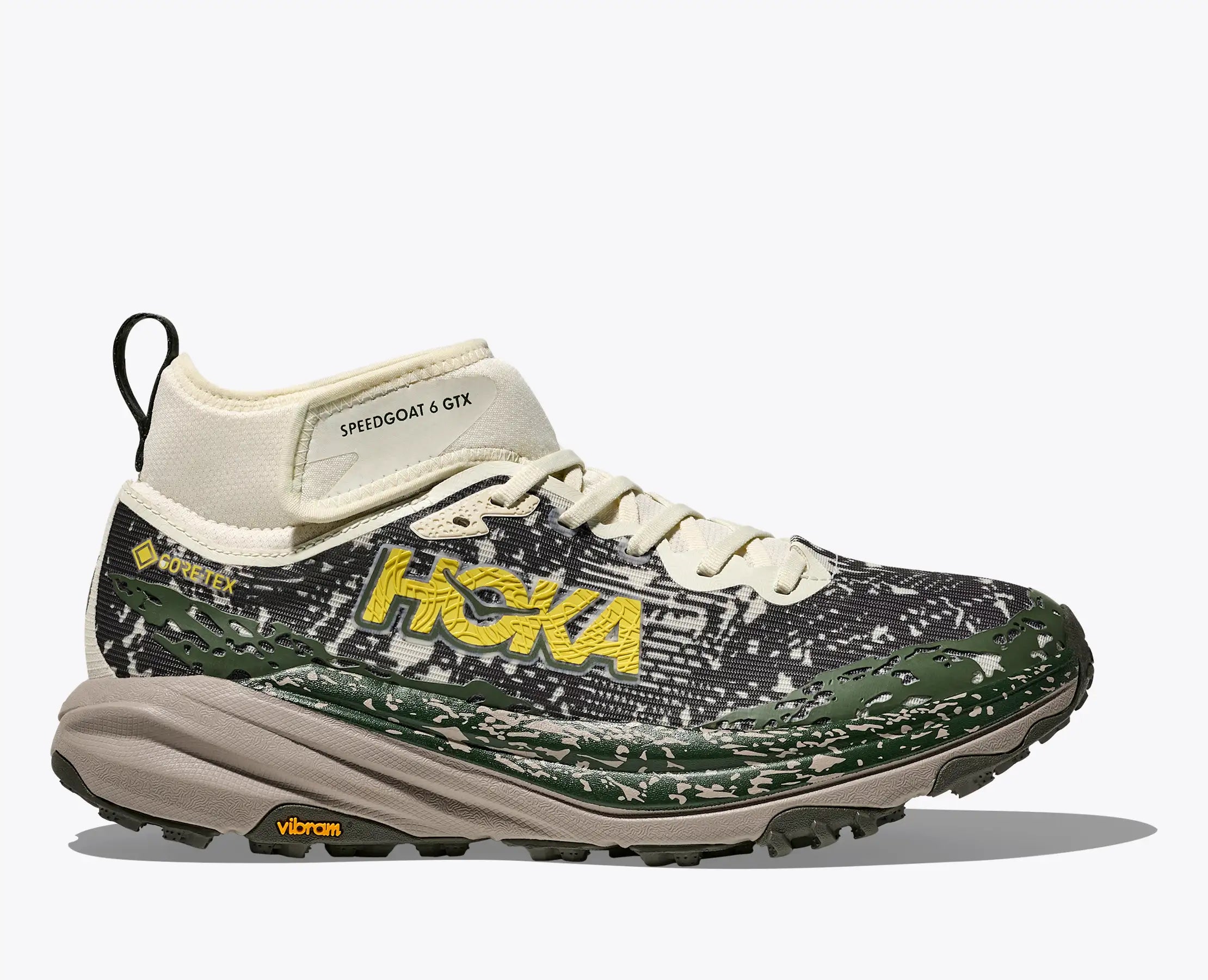 Side view on white background of Mens Hoka Speedgoat 6 Mid GTX running shoe in Truffle Salt/Cement, Medium (Regular) width
