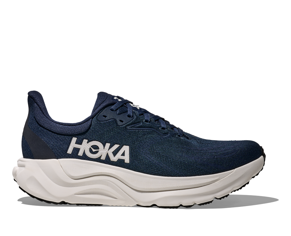 Side view on white background of Mens Hoka Arahi 8 running shoe in Varsity Navy/White, Wide width