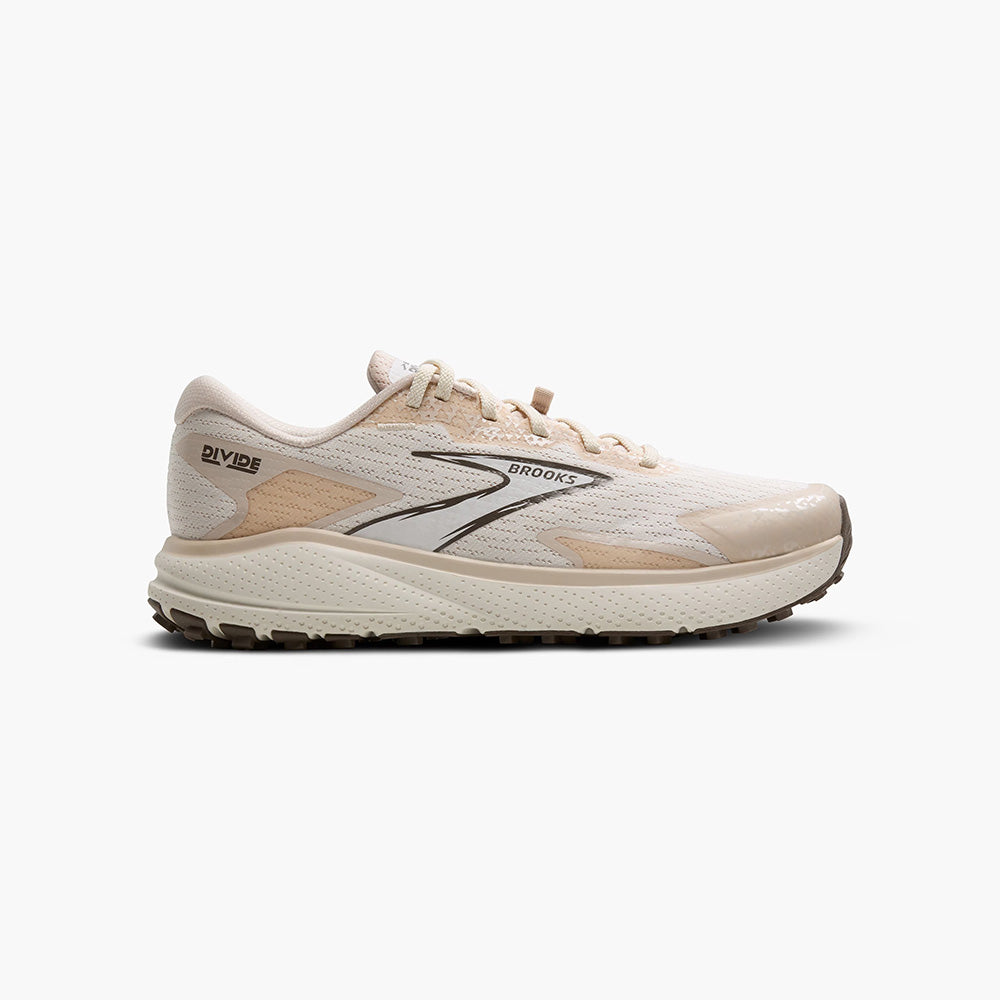 Side view on white background of Womens Brooks Divide 5 running shoe in Coconut/Almond Peach/ Falcon, Medium (Regular) width