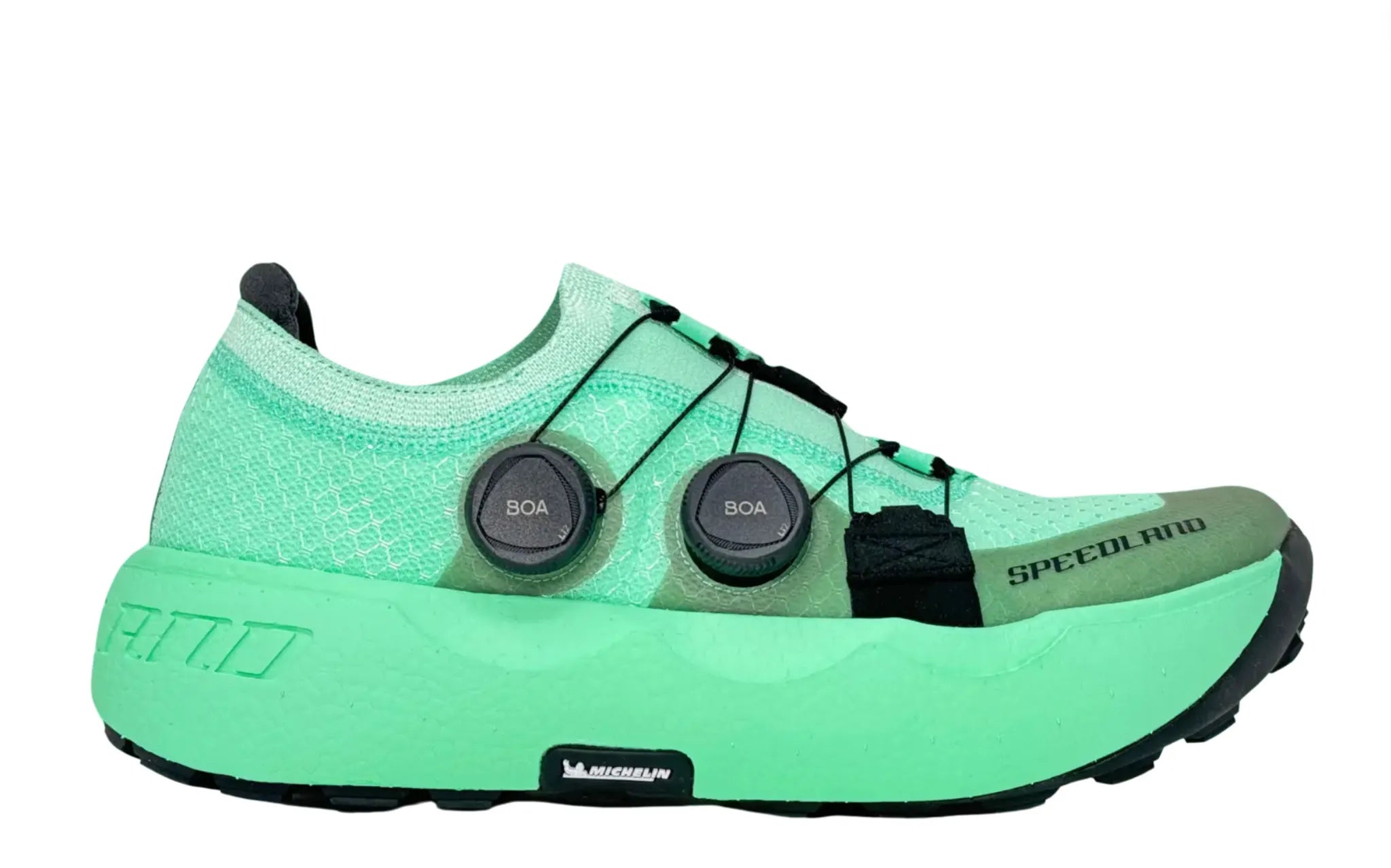 Side view on white background of Unisex Speedland GS:PDX running shoe in Green/Black, Medium (Regular) width