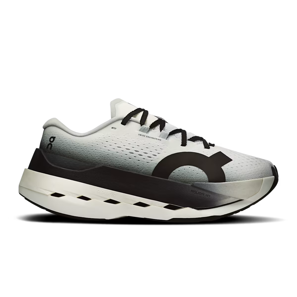 Side view on white background of Womens On Cloudboom Max running shoe in White/Black, Medium (Regular) width