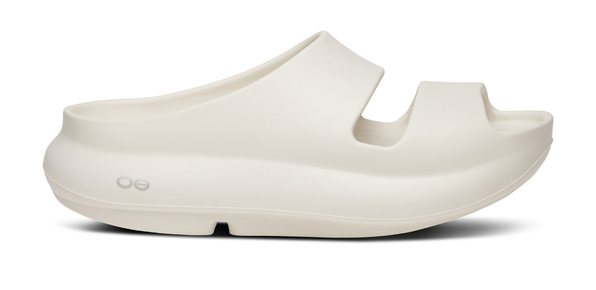 Side view on white background of Womens OOFOS OOyea Plus running shoe in Chalk, Medium (Regular) width