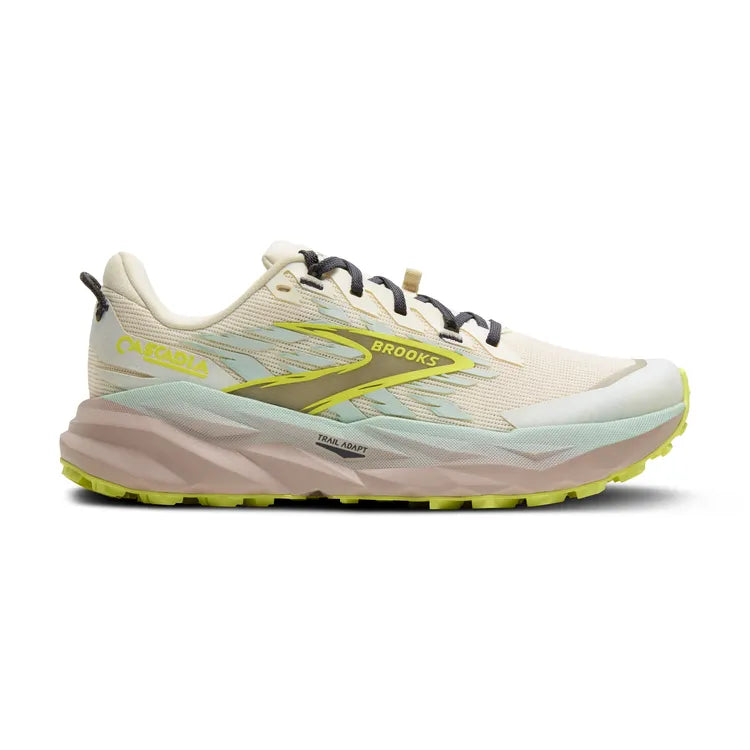 Side view on white background of Womens Brooks Cascadia 19 running shoe in Coconut/Misty Blue/Ebony, Medium (Regular) width