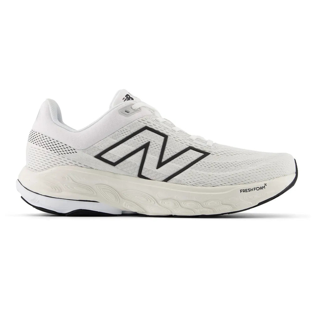 Side view on white background of Mens New Balance Fresh Foam X 860v14 running shoe in White/Black/Sea Salt, Wide width