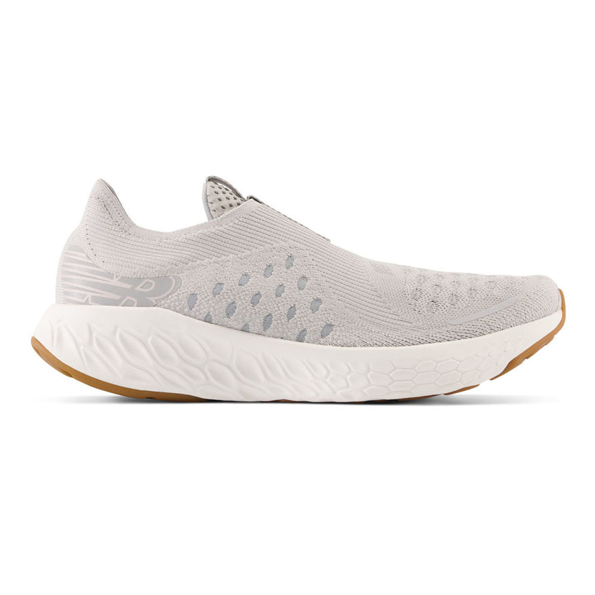 Side view on white background of Womens New Balance Fresh Foam X 1080 Unlaced running shoe in Light Aluminum/Silver Mink, Medium (Regular) width
