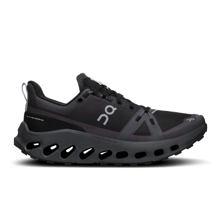 Side view on white background of Womens On Cloudsurfer Trail WP running shoe in Black/Eclipse, Medium (Regular) width