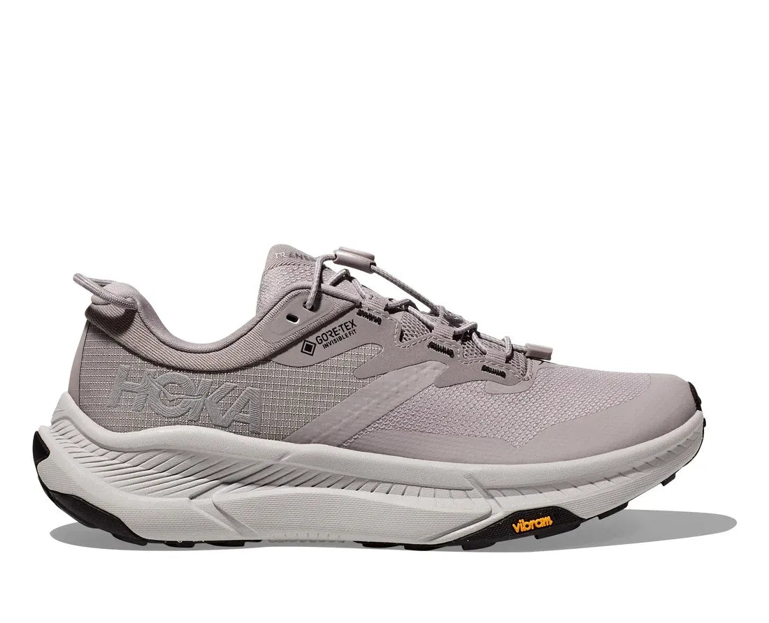 Side view on white background of Womens Hoka Transport GTX running shoe in Opal/Vaporous, Medium (Regular) width
