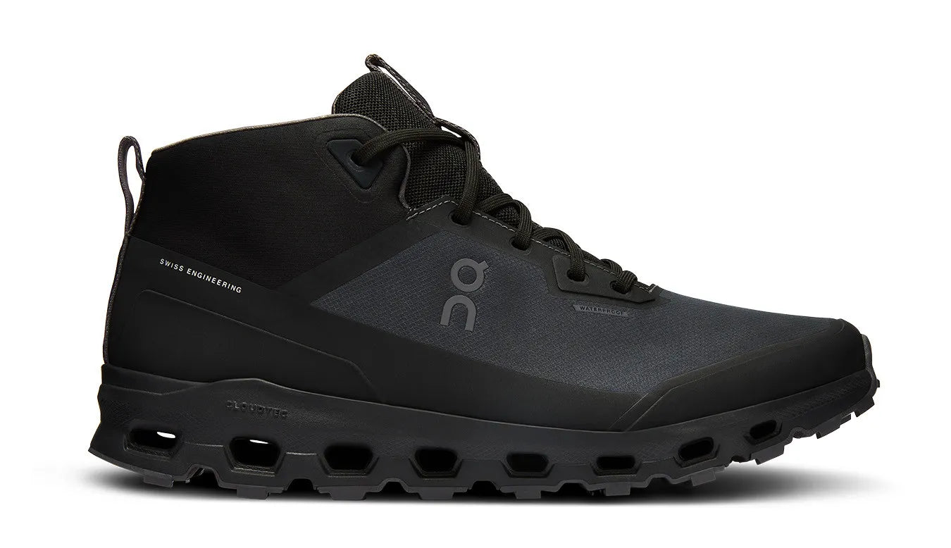 Side view on white background of Mens On Cloudroam Waterproof running shoe in Black/Eclipse, Medium (Regular) width