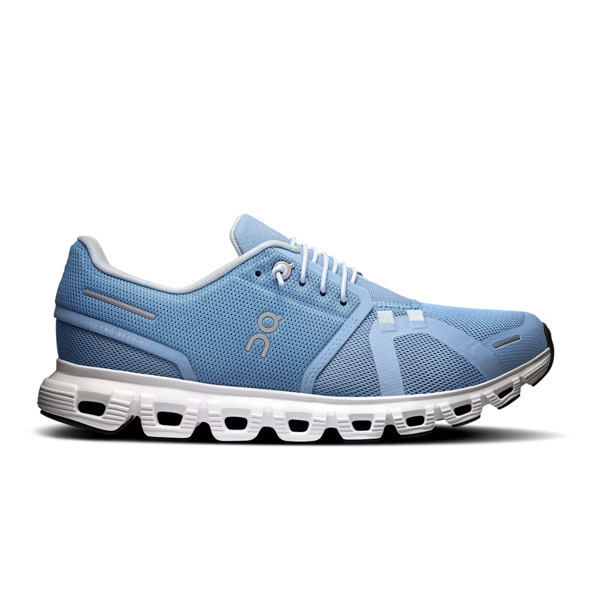 Side view on white background of Mens On Cloud 6 running shoe in Chambray/White, Medium (Regular) width