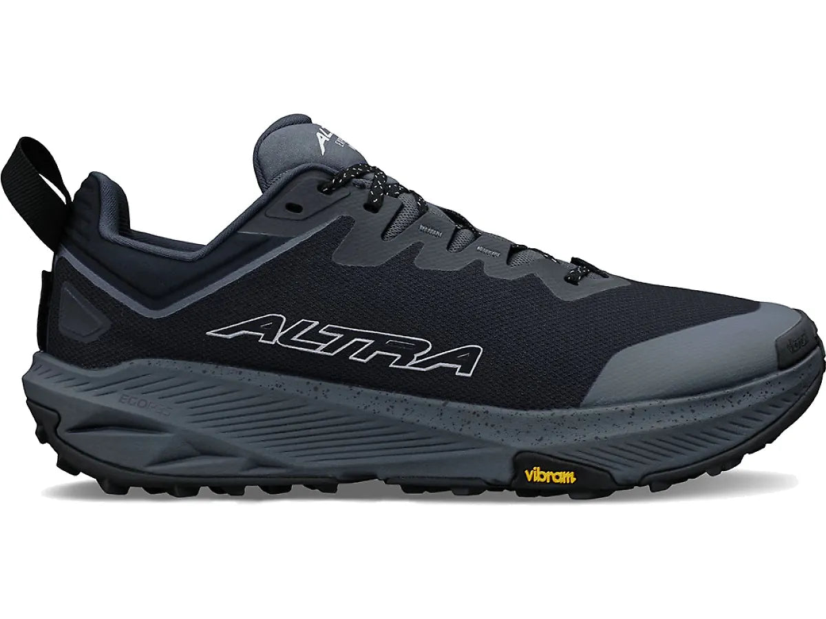 Side view on white background of Mens Altra Experience Wild 3+ running shoe in Black/Black, Medium (Regular) width