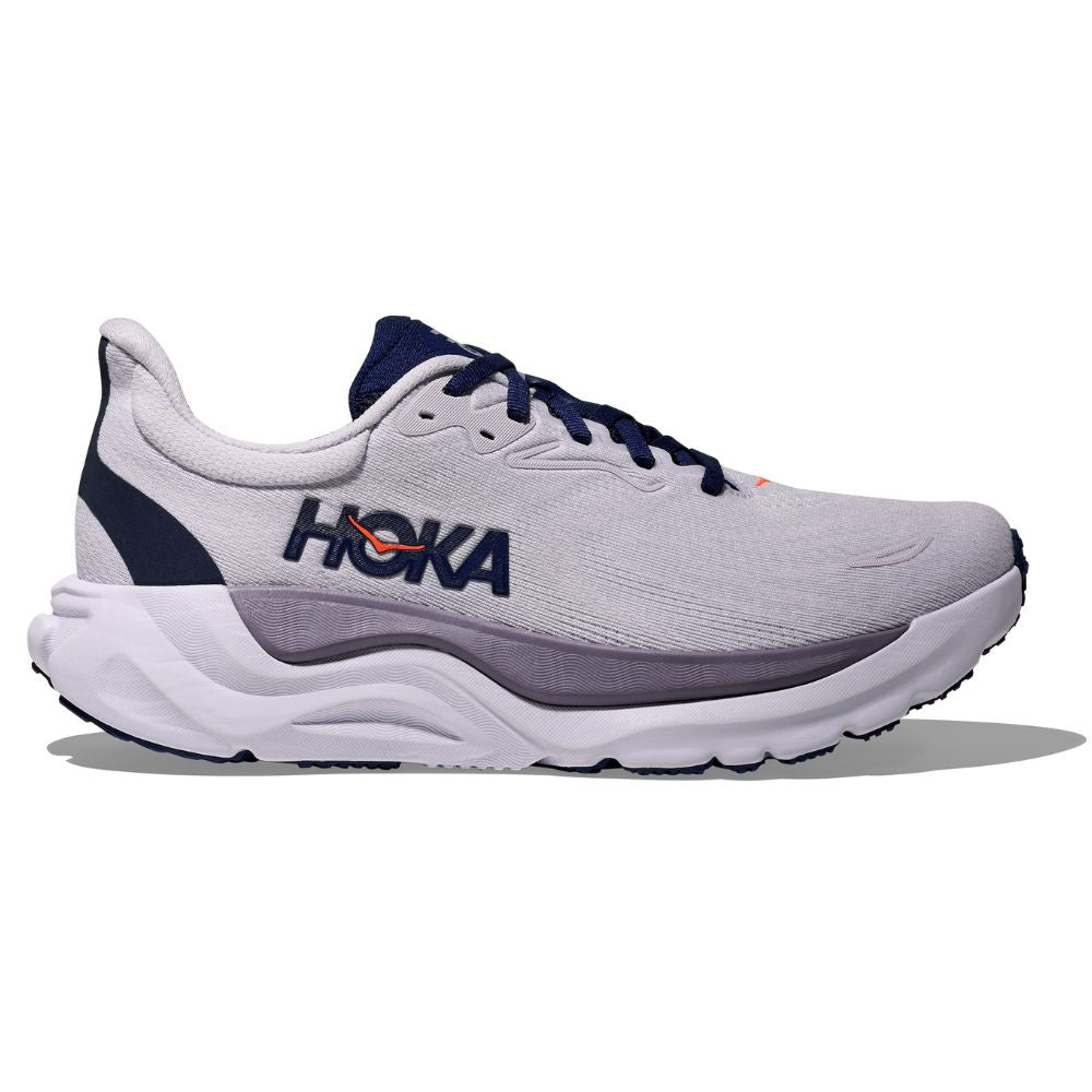 Side view on white background of Womens Hoka Arahi 8 running shoe in Starlight Glow/Midnight Blue, Wide width