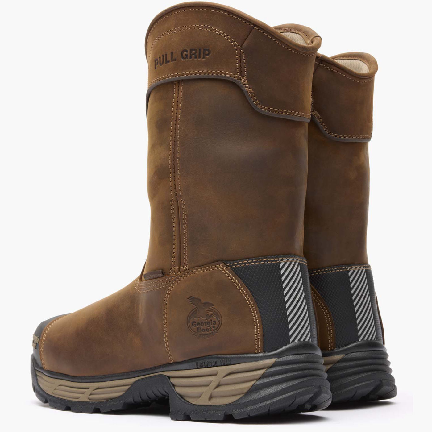 Rear view of brown boots showing pull straps and heel construction.