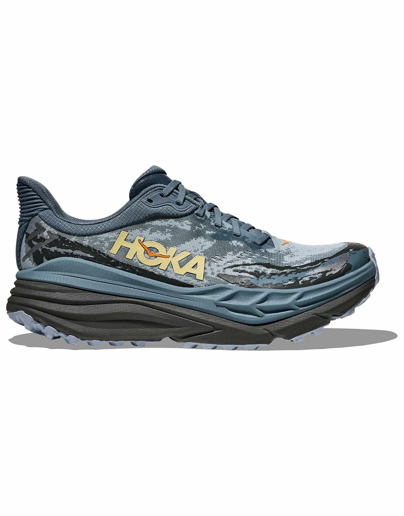 Side view on white background of Mens Hoka Stinson 7 running shoe in Slate Blue/Asphalt Grey, Medium (Regular) width
