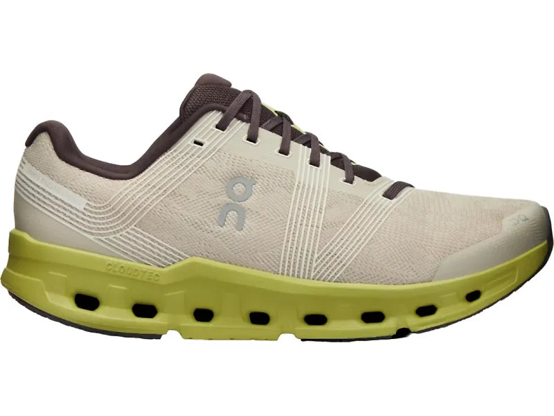 Side view on white background of Mens On Cloudgo running shoe in Sand/Zest, Medium (Regular) width