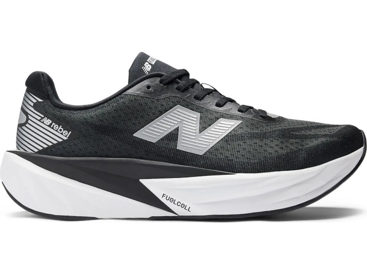 Side view on white background of Mens New Balance FuelCell Rebel v5 running shoe in Black/Silver Metallic/White, Medium (Regular) width