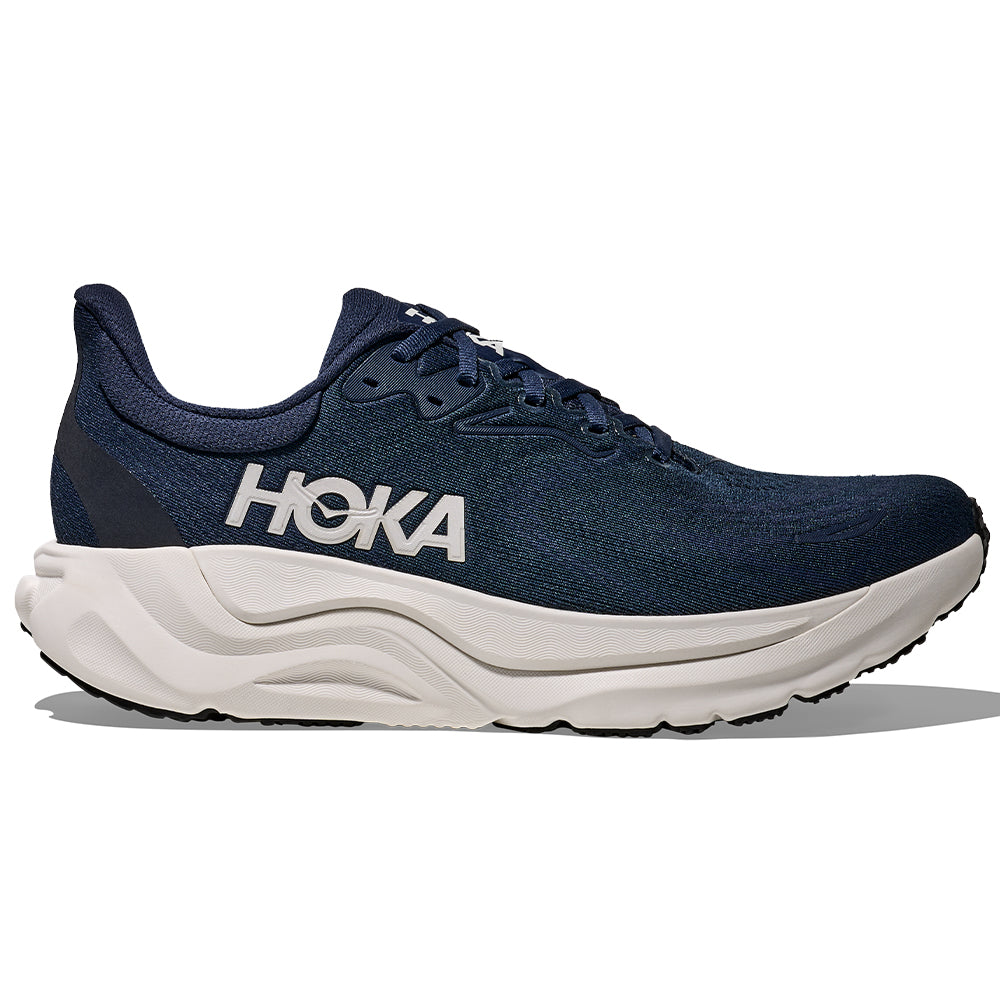 Side view on white background of Mens Hoka Arahi running shoe in Varsity Navy/White, Medium (Regular) width