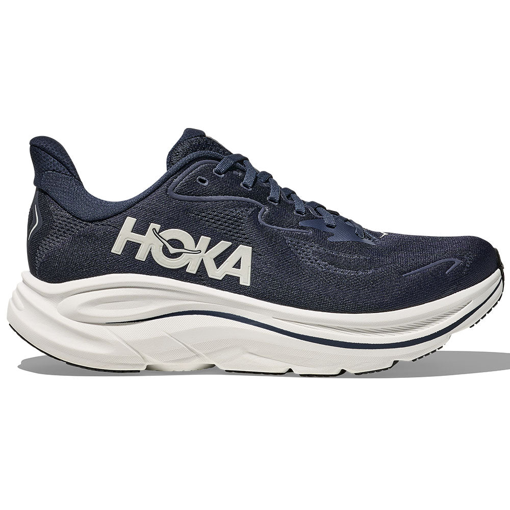 Side view on white background of Mens Hoka Clifton running shoe in Navy/White, Medium (Regular) width