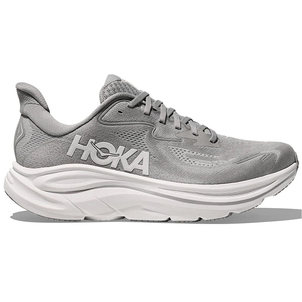 Side view on white background of Mens Hoka Clifton running shoe in Stellar Grey/Stardust, Wide width