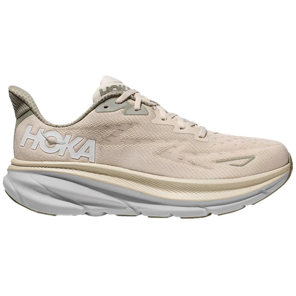 Side view on white background of Mens Hoka Clifton running shoe in Oat Milk/Barley, Wide width