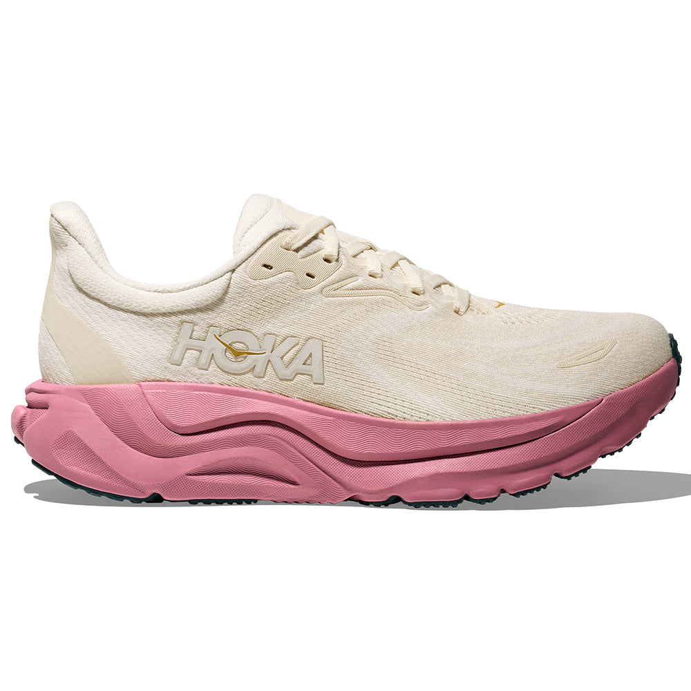 Side view on white background of Womens Hoka Arahi running shoe in Alabaster/Lingonberry, Medium (Regular) width