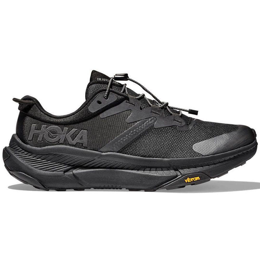 Side view on white background of Mens Hoka Transport running shoe in Black/Black, Medium (Regular) width