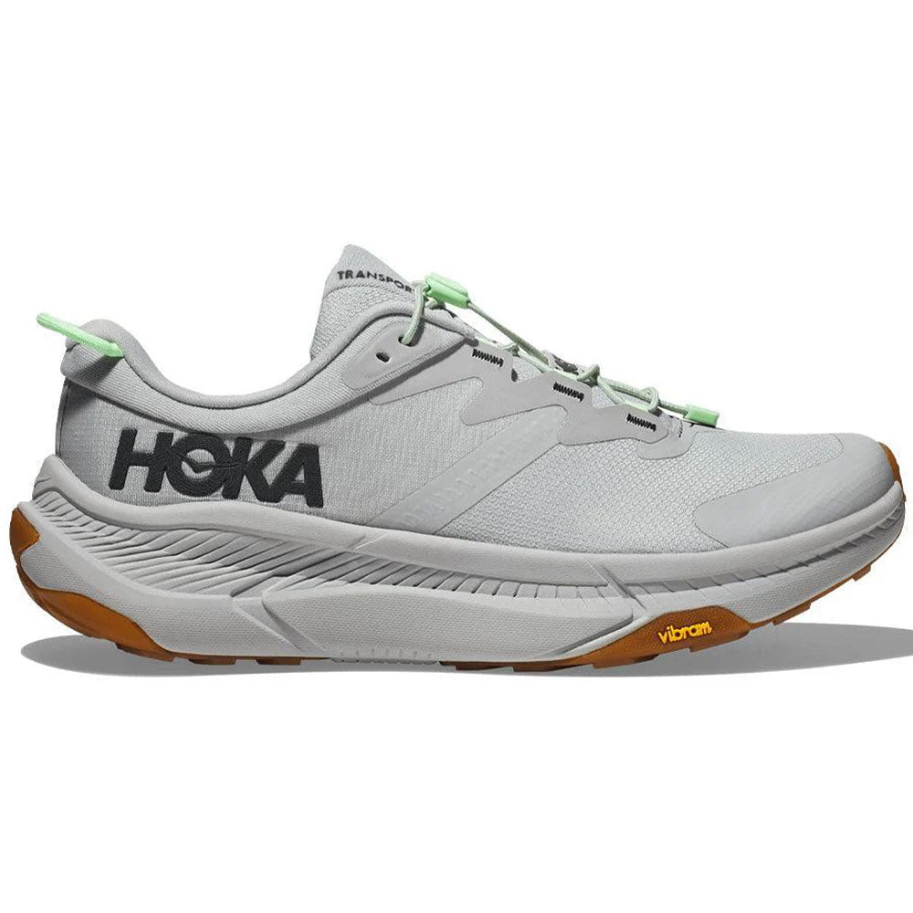 Side view on white background of Mens Hoka Transport running shoe in Harbor Mist/Lime Glow, Medium (Regular) width