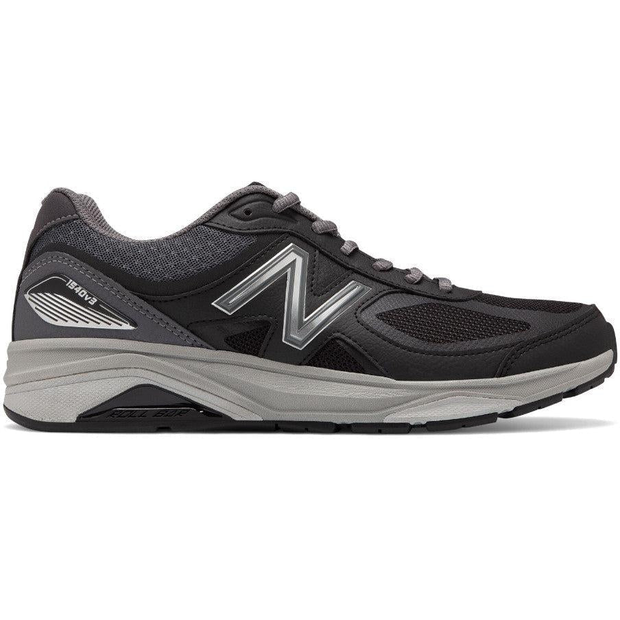 Side view on white background of Mens New Balance 1540 running shoe in Black/Castlerock, Wide width