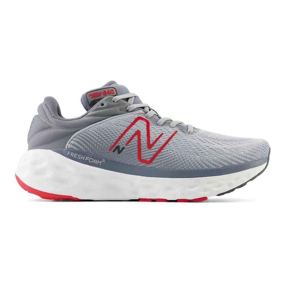Side view on white background of Mens New Balance Fresh Foam X 840 running shoe in Aluminum Grey/True Red, Medium (Regular) width