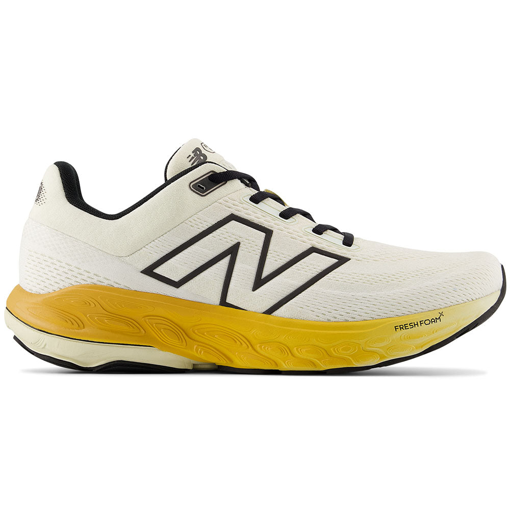 Side view on white background of Mens New Balance Fresh Foam 860 running shoe in Sea Salt/Angora/Dried Apricot, Narrow width