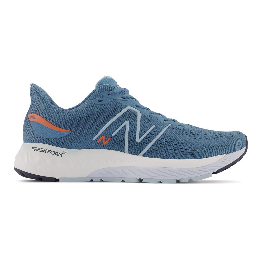 Side view on white background of Mens New Balance Fresh Foam 880 running shoe in Spring Tide, Wide width