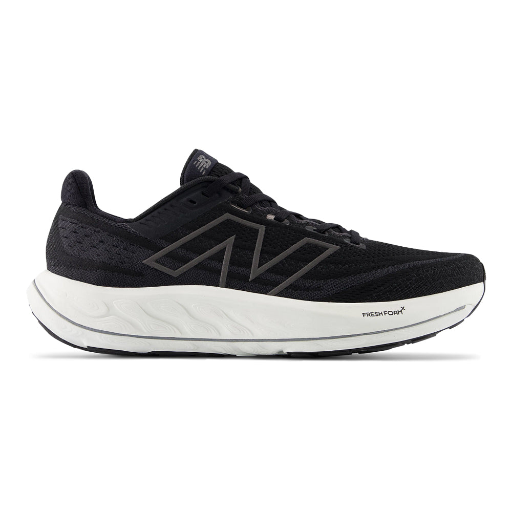 Side view on white background of Mens New Balance Fresh Foam Vongo running shoe in Black/White, Medium (Regular) width