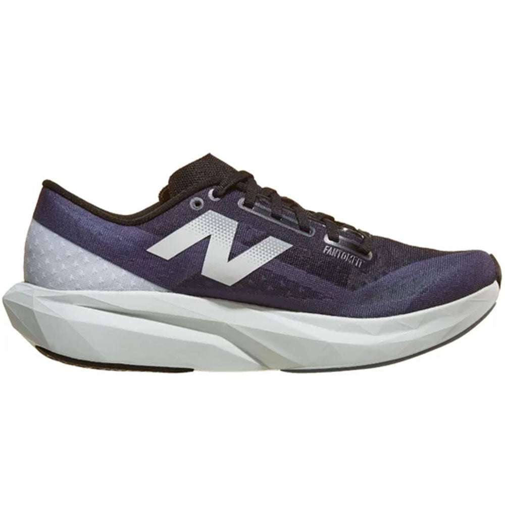 Side view on white background of Mens New Balance FuelCell Rebel running shoe in Graphite/Black/Quartz Grey, Wide width