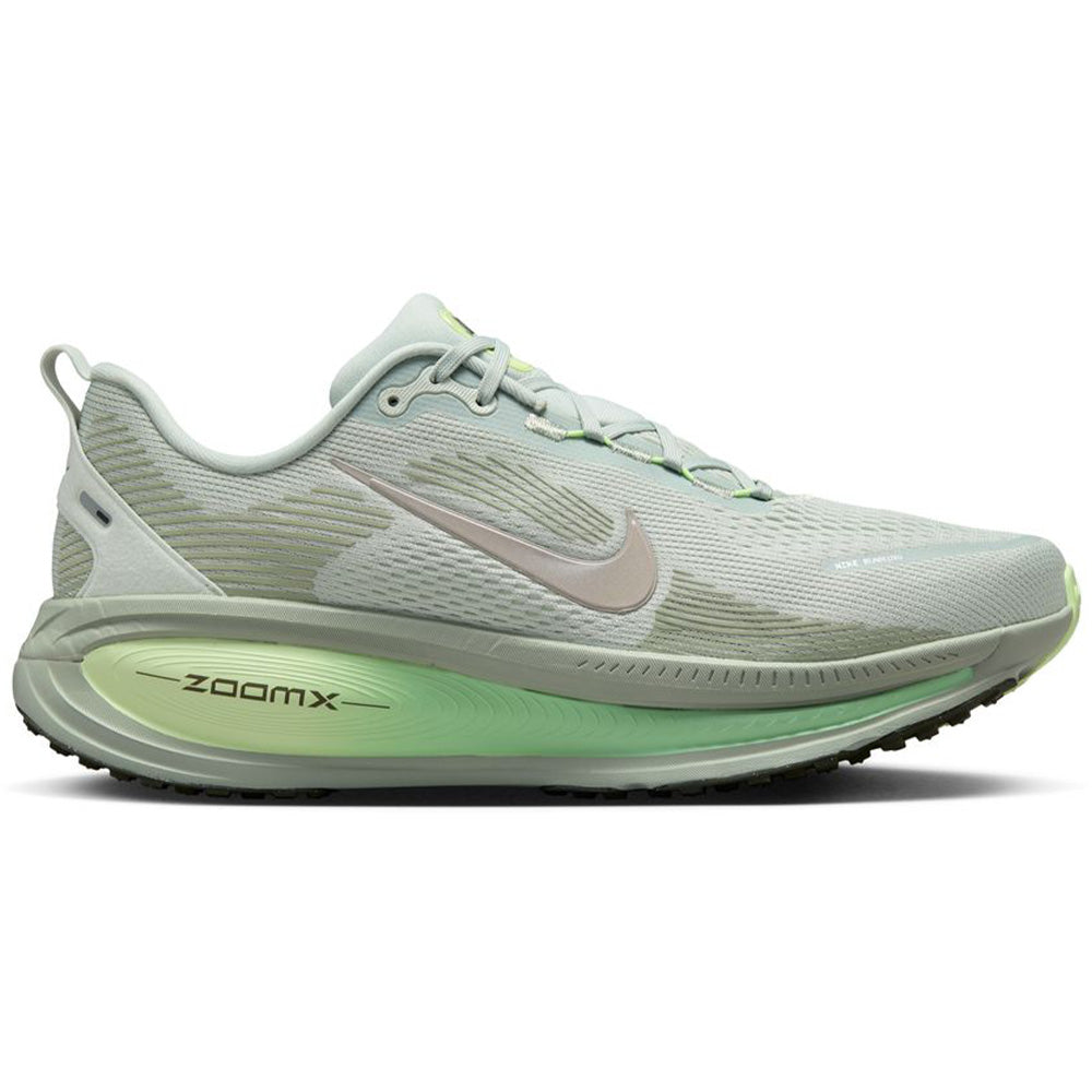 Side view on white background of Mens Nike Vomero 18 running shoe in Light Silver/College Grey/Barely Volt, Medium (Regular) width