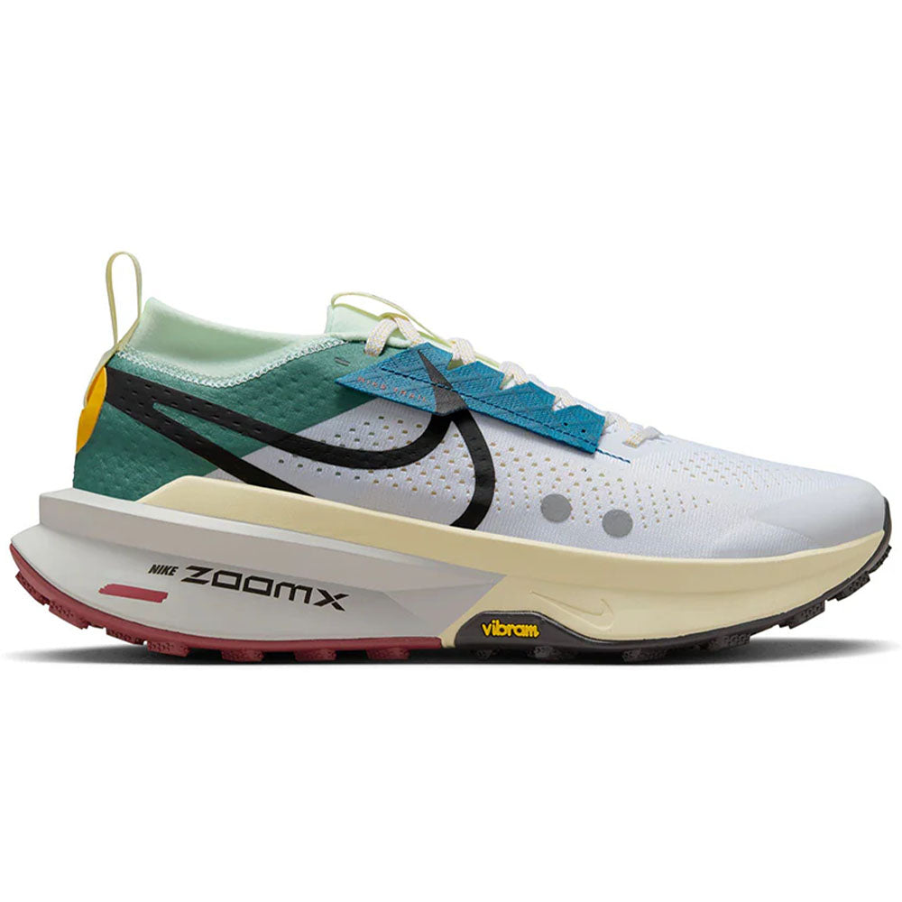 Side view on white background of Mens Nike ZoomX Zegama running shoe in White/Black/Bicoastal/Court Blue, Medium (Regular) width